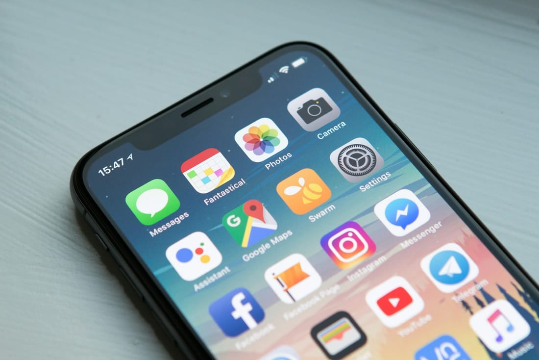 A parent choosing what their child can watch from a phone